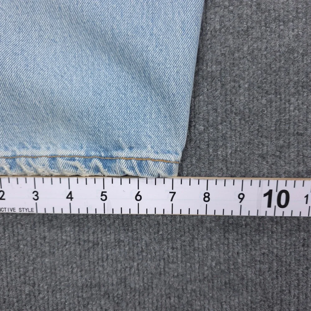 VINTAGE Levis 560 Loose Fit Tapered Leg Jeans Light Wash Blue Mens Denim 34x32